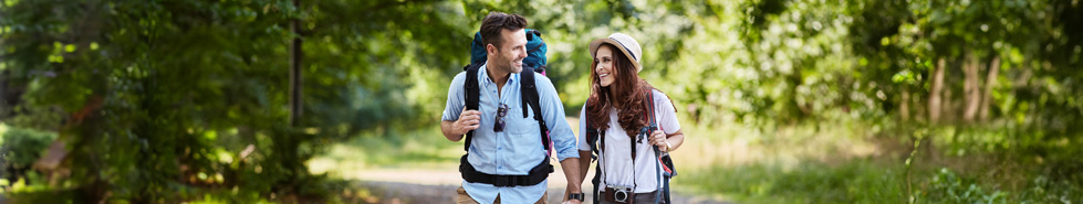 Woman and men on a trip.